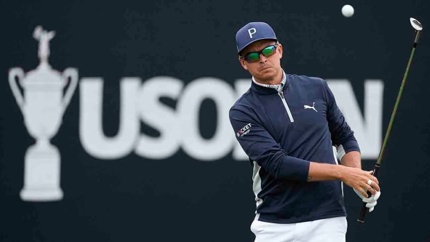 Rickie Fowler hits a pitch shot during practice for the 2023 U.S. Open.